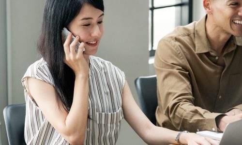 Photo of a woman talking on the phone.