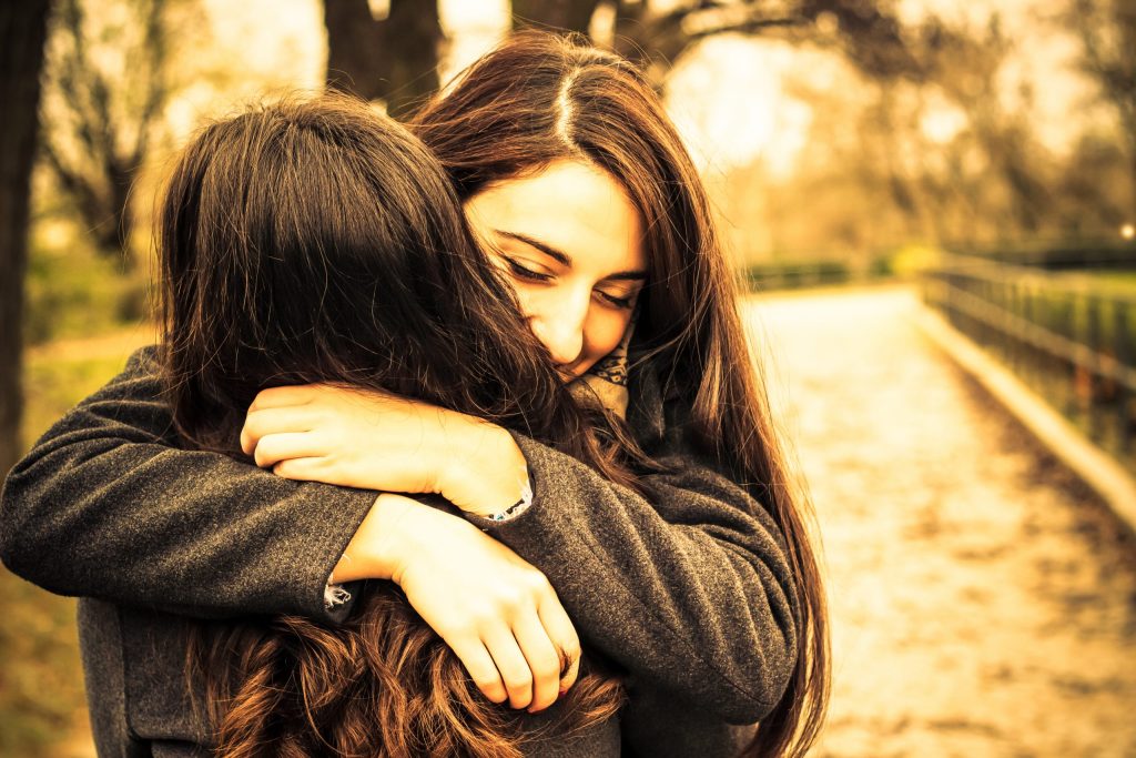 Photo of two women hugging