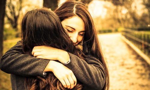 Photo of two women hugging