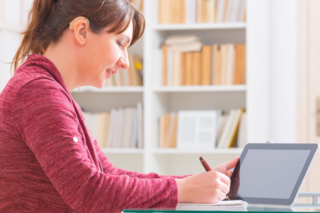 Photo of a woman using a laptop