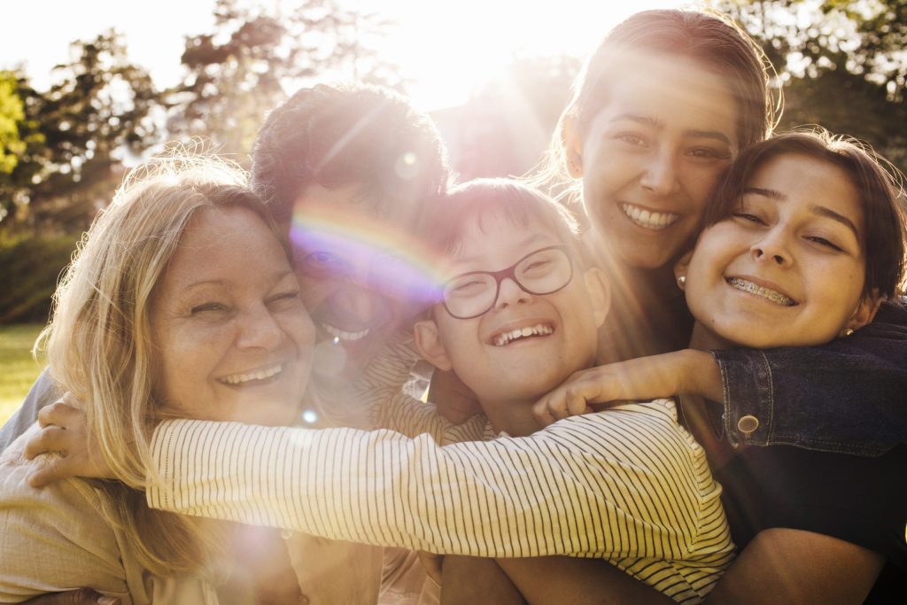 A photo of 5 women representing disability and diversity