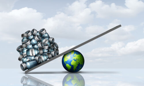 A digital illustration of the Earth, with a scale balancing on top of it. On the left-hand side of the scale, a pile of blue and grey vaccine vials weighs down the scale, with nothing on the other end, representing vaccine inequity and the unequal balance of vaccine distribution. At the bottom of the image is a reflection of the illustration, and in the background is an image of a light blue sky with white clouds.